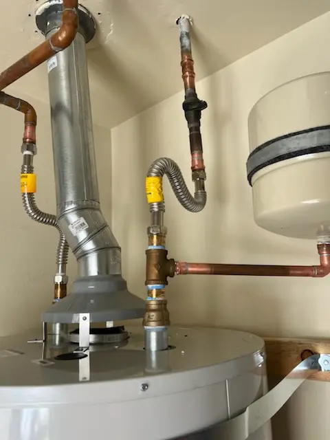 Water heater installation and plumbing repair in Cadillac